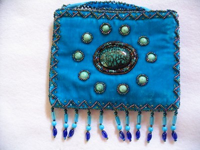 Turquoise small bag w/ 10 pts.